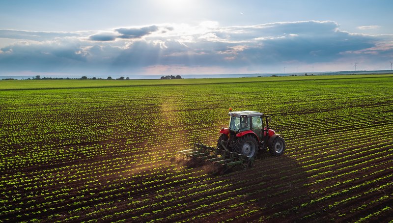 csm_tractor_cultivating_field_at_spring_53d2940097.jpg